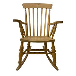 Farmhouse style beech rocking chair, shaped cresting rail on vertical slats, on turned front supports joined by swell-turned double H stretcher base