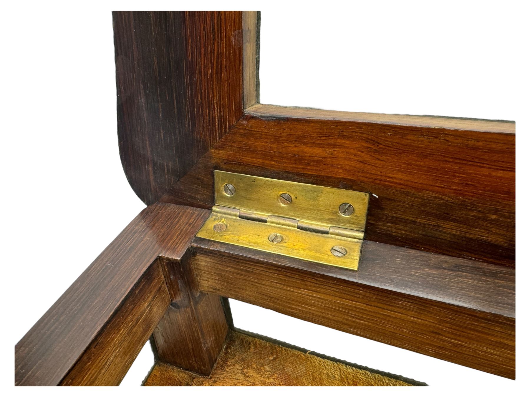 Victorian inlaid rosewood bijouterie table cabinet, shaped form, enclosed by hinged bevel glazed lid with shell and floral inlays, fabric lined interior, glazed sides within foliate cast gilt metal edging, on cabriole supports with floral cast gilt metal mounts and terminal caps 