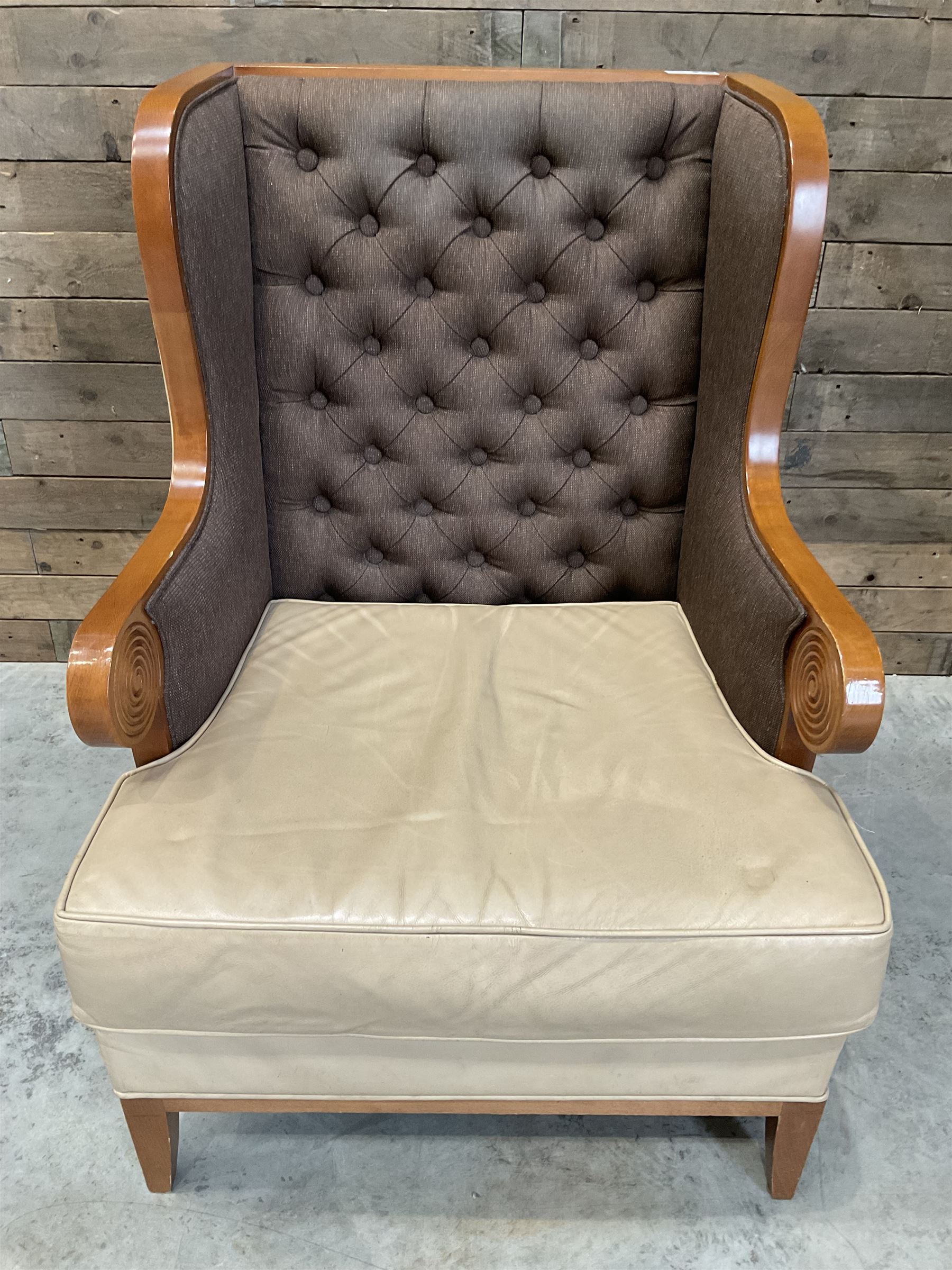 Walnut finish framed wing back armchair upholstered leather and buttoned fabric