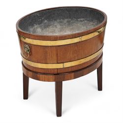 George III Chippendale design brass bound mahogany wine cooler of oval form, the coopered ...