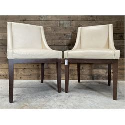 28 x walnut framed dining chairs, upholstered in beige leather