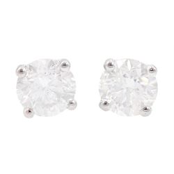 Pair of 18ct white gold round brilliant cut diamond stud earrings, stamped 750, total diamond weight 1.05 carat, with World Gemological Institute report