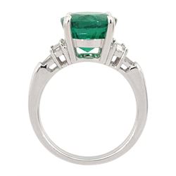 18ct white gold three stone round emerald, baguette and tapered baguette cut diamond ring, hallmarked, emerald approx 3.10 carat