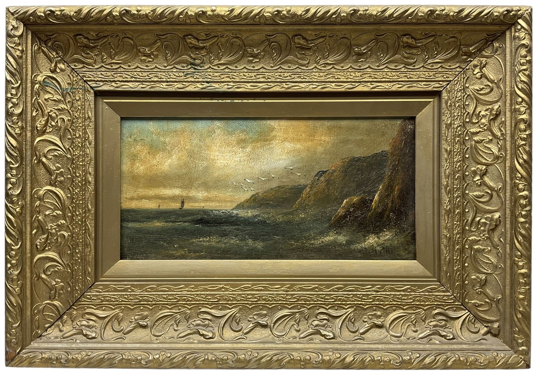 H Melville (British 19th Century): Seascapes at Sunset, pair oils on canvas signed 19cm x 39cm (2)