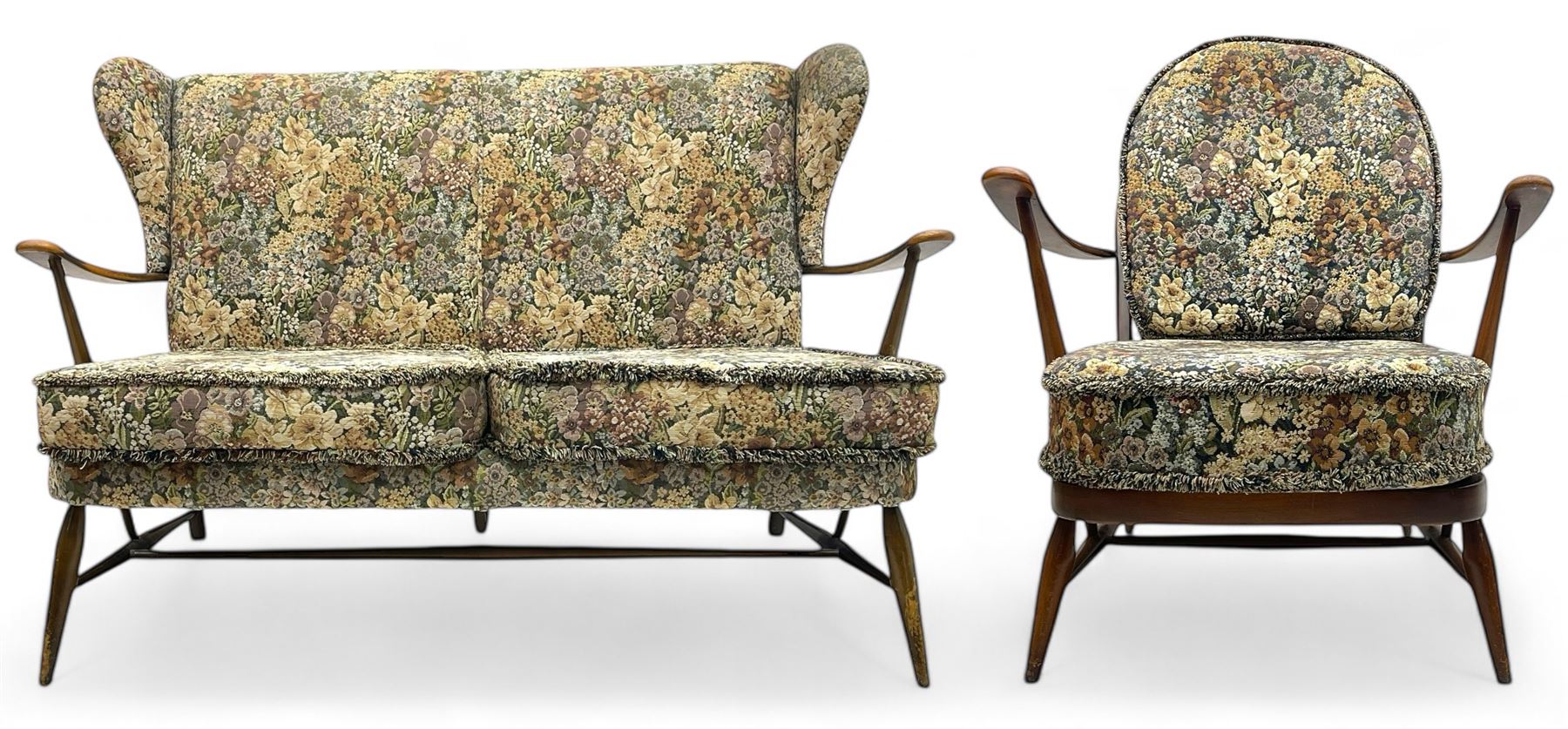 Lucian Ercolani for Ercol - mid-20th century beech and elm 'Windsor 203' two-seat sofa, wingback design upholstered in floral pattern over sprung seat and backrest, open curved arms, on splayed supports with stretchers (W133cm, D87cm, H90cm); matching easy chair (W70cm, D97cm, H82cm)