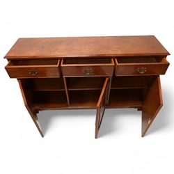 Georgian design figured walnut sideboard, moulded rectangular top over three drawers and three cupboards, on bracket feet 