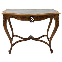 French design walnut console table, shaped top with inset grey marble panel, the frieze pierced and carved with scrolling foliage and applied flower heads, raised on cabriole supports with cartouche carved knees, united by shaped X-stretcher