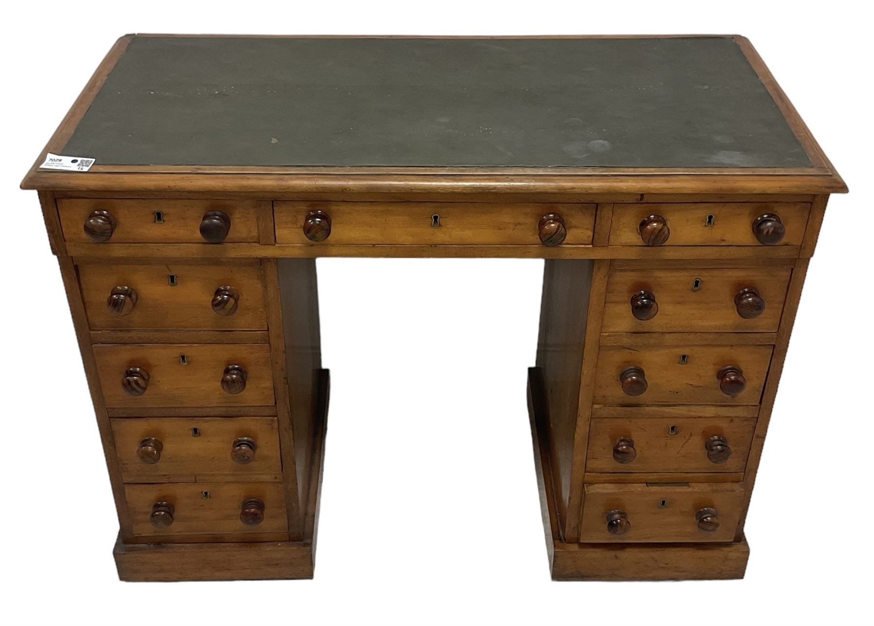 Victorian mahogany twin pedestal desk, rectangular top with inset green leather writing surface, fitted with central frieze drawer flanked by five graduating drawers on each side 