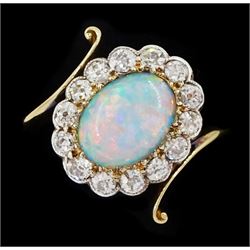 Early 20th century gold opal and milgrain set old cut diamond cluster ring, with twist scroll shoulders, stamped 18ct, total diamond weight approx 0.55 carat