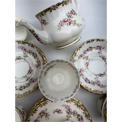 Royal Albert Dimity Rose pattern tea service for six place settings, including teapot, teacups and saucers, sugar bowl and two milk jugs, all with printed mark beneath