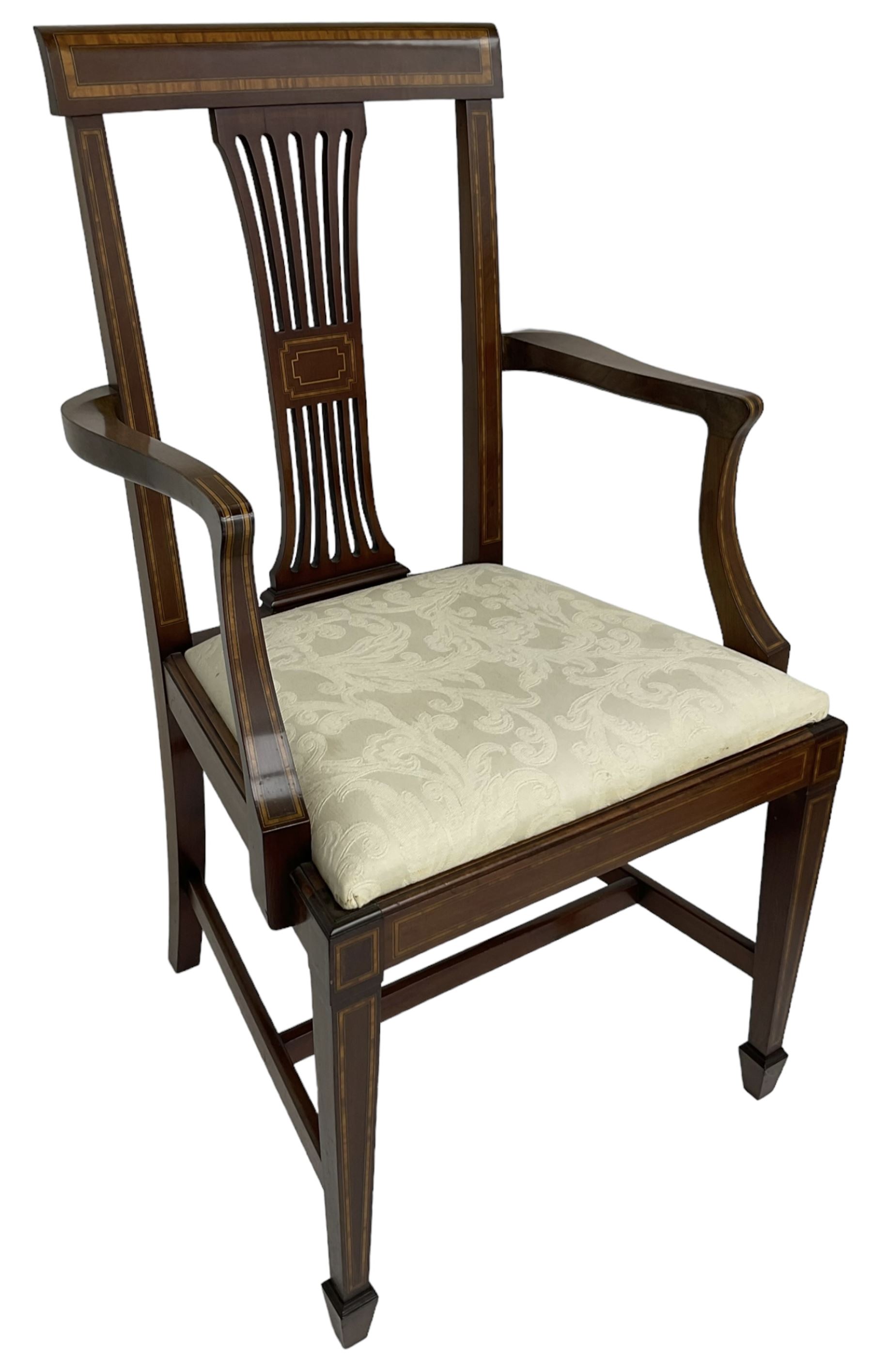 Set of four (2+2_ Edwardian inlaid mahogany dining chairs, cresting rail with satinwood banding, pierced splat backs with central inlay, drop-in seats upholstered in foliate patterned ivory fabric, raised on square tapering supports terminating in spade feet