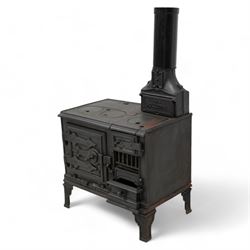 'The Holloway' cast iron portable range stove, fitted with surface burners and oven, on angular bracket feet 