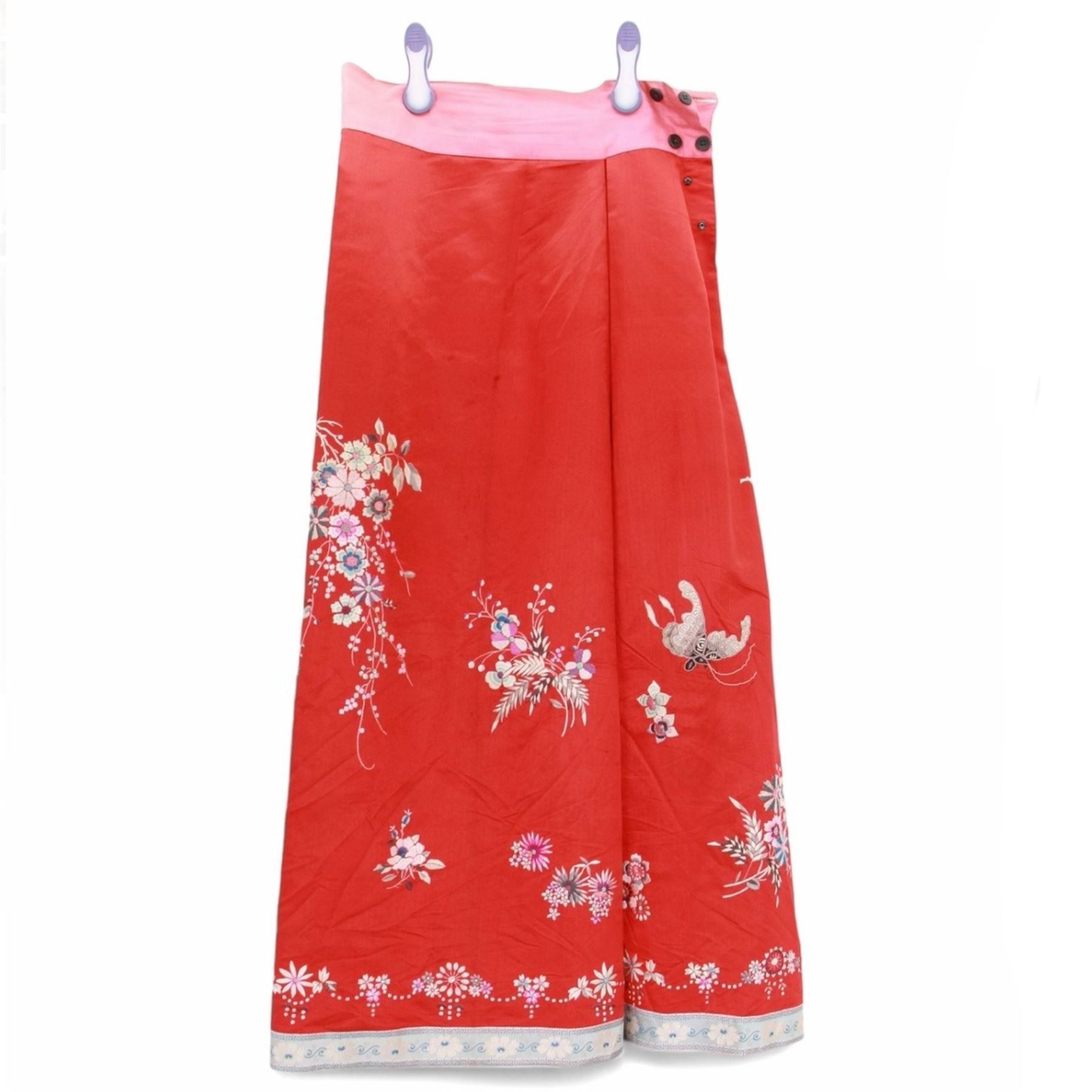 Early 20th century Chinese Han silk skirt, embroidered with flowers and butterflies, on a red ground, purchased from Liberty, London