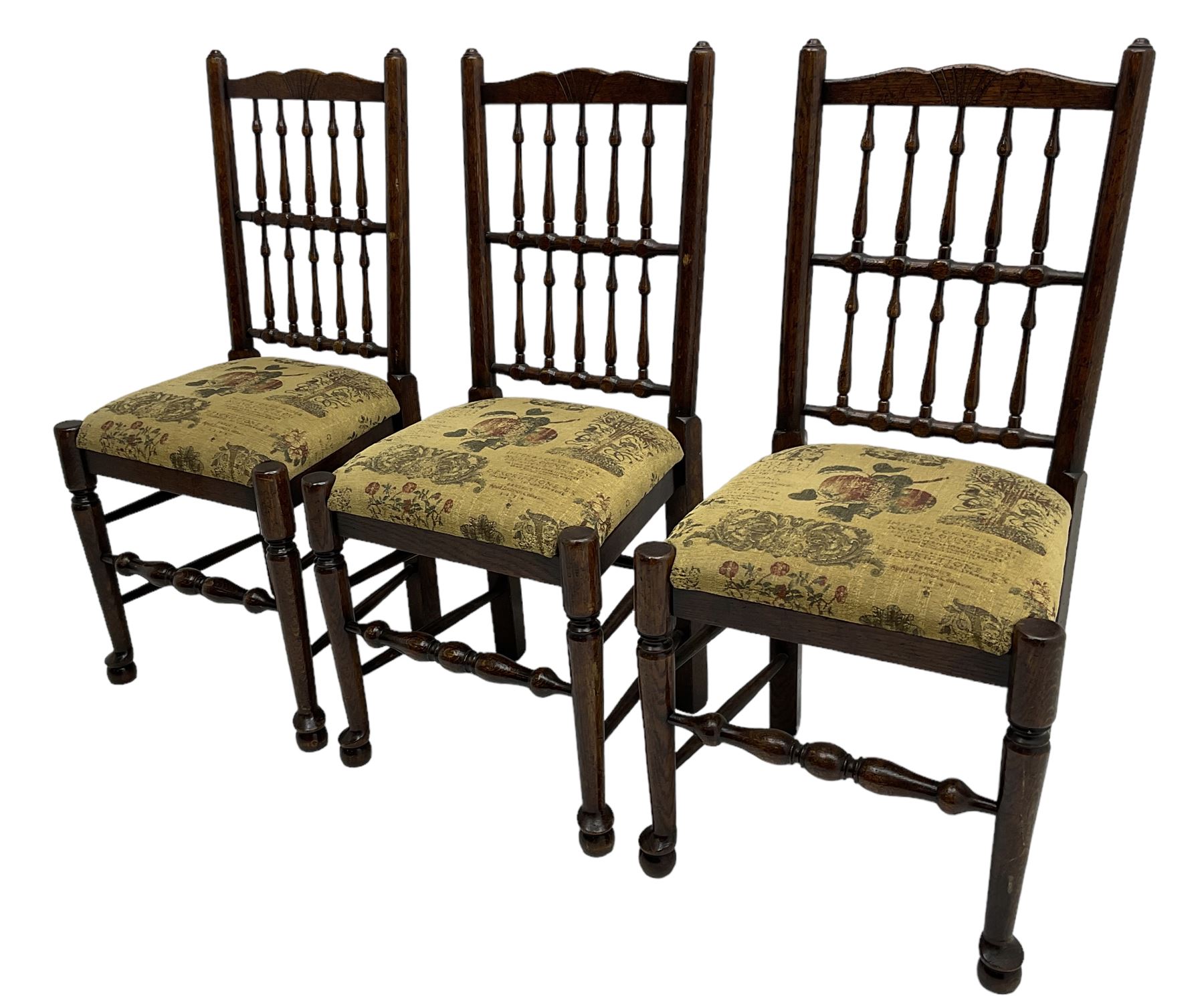 Set of six (4+2) 20th century oak spindle back dining chairs, with upholstered drop-on seat cushions, turned supports joined by turned stretchers