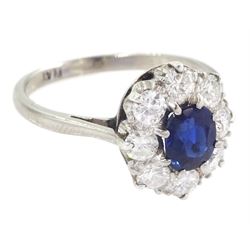 Platinum oval cut sapphire and transitional cut diamond cluster ring, stamped Plat, sapphire approx 0.70 carat, total diamond weight approx 0.80 carat