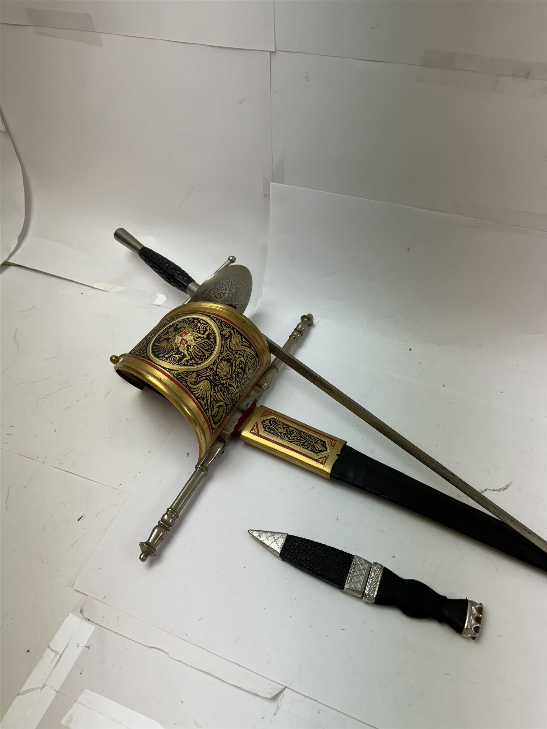 Spanish crossed sword, marked Toledo to the blade, together with a fencing foil and a decorative scottish dagger