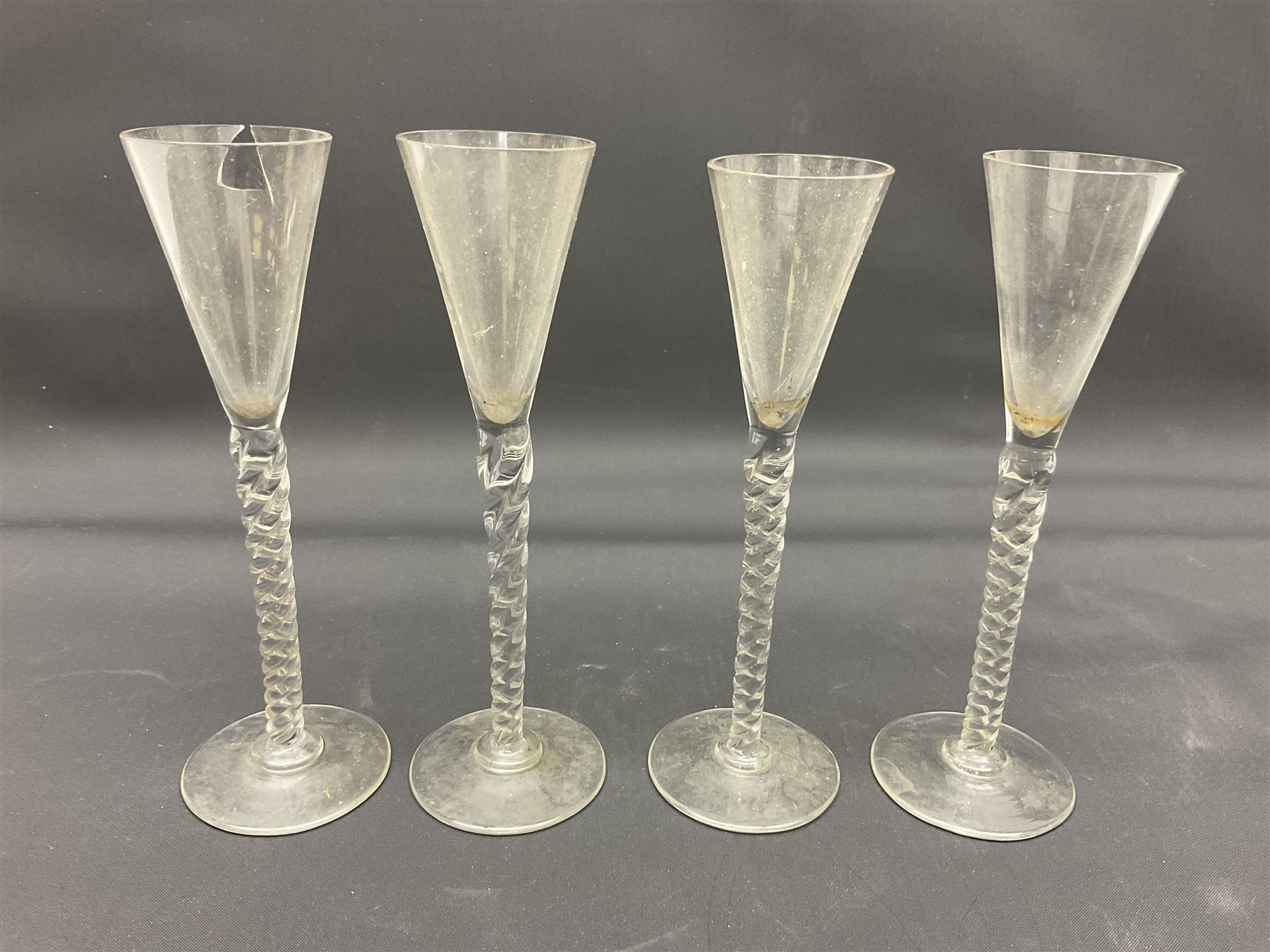 Collection of 18th century and later glassware, including set of three with twist stems and etched and fluted examples