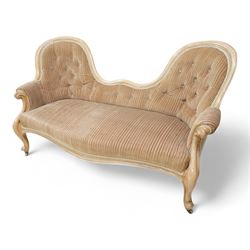 Victorian walnut framed double-ended two-seat settee, upholstered in buttoned striped fabric, on shaped and scroll carved cabriole supports with castors 