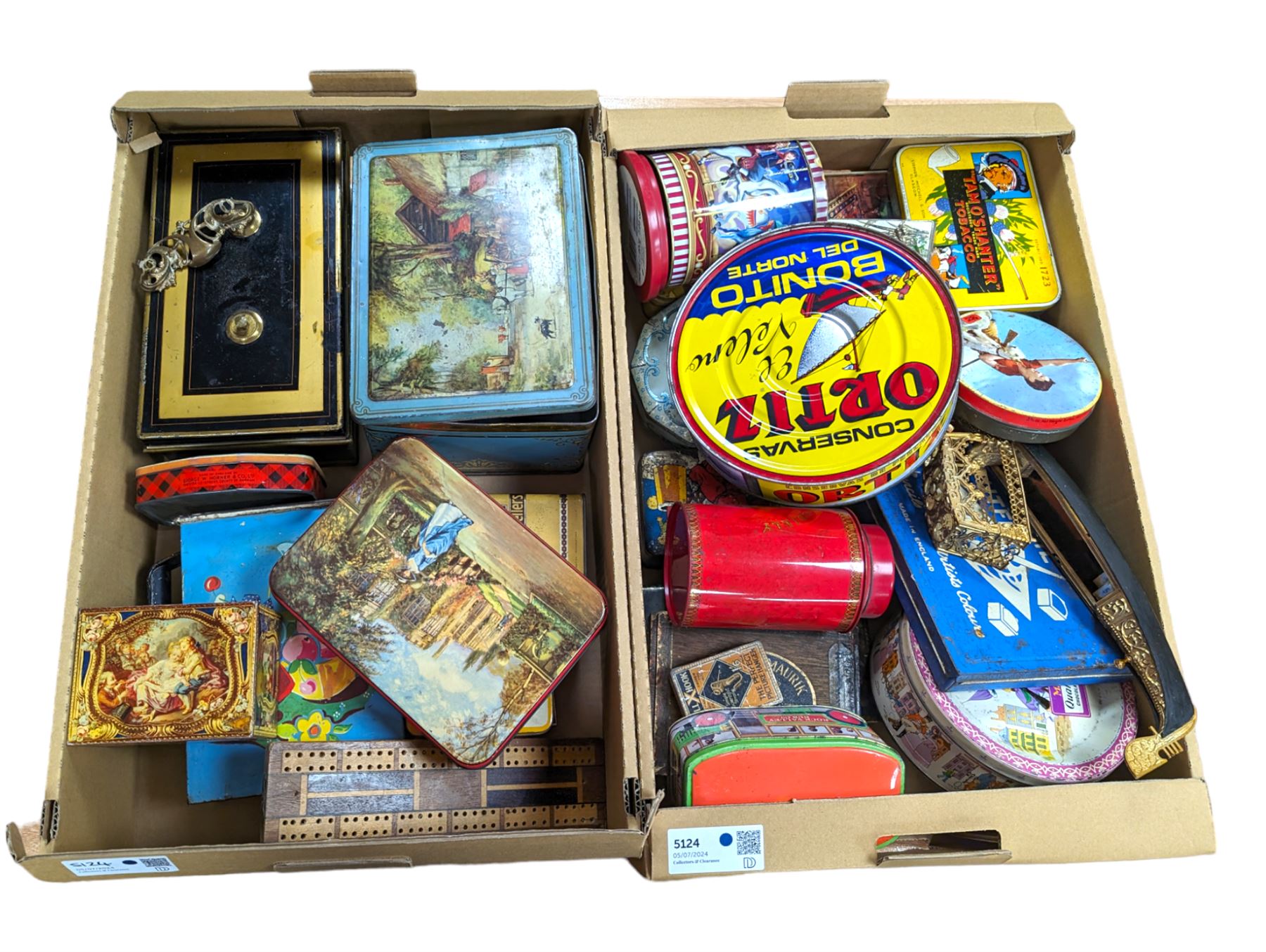 Collection of vintage tins and boxes, including advertising examples