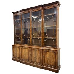 Bevan Funnell - Georgian design mahogany breakfront bookcase, moulded dentil and arcaded frieze over four astragal glazed doors, four cupboards below enclosed by figured doors, on skirted base