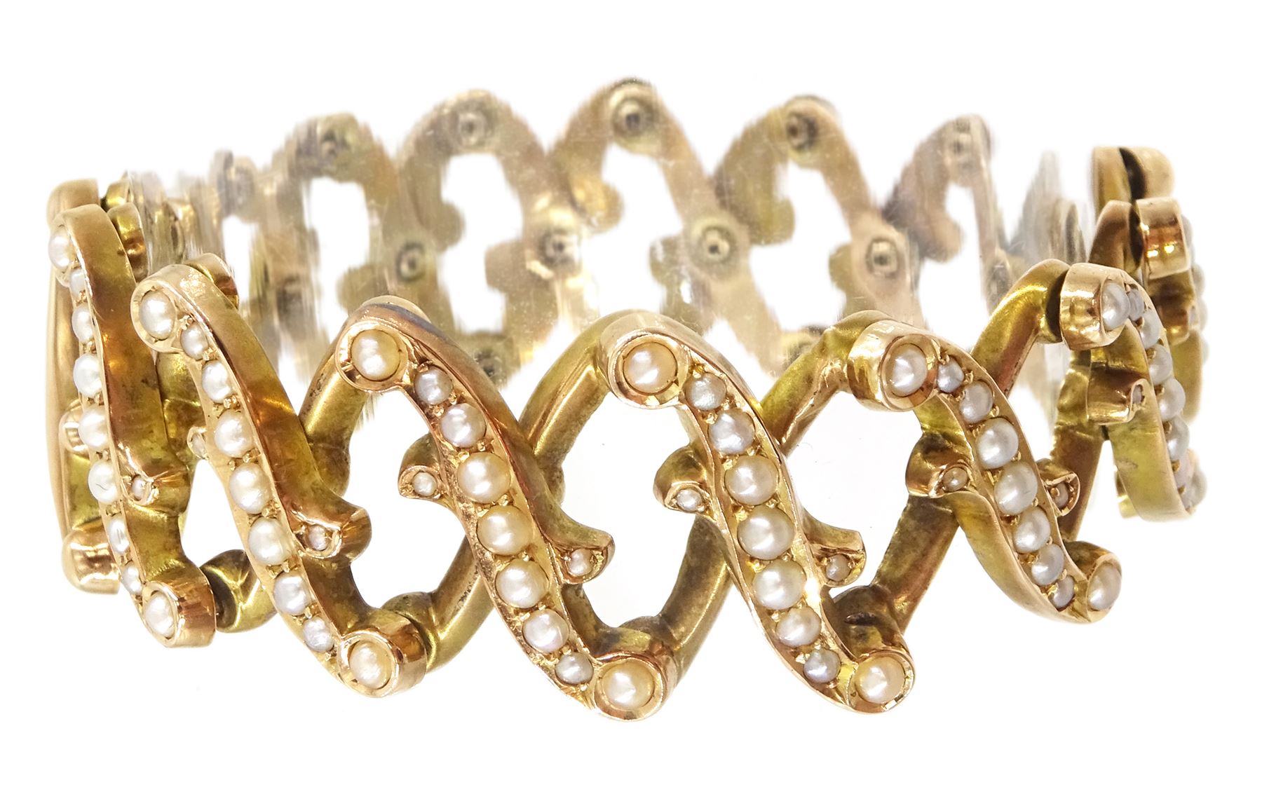 Victorian gold seed pearl, scroll design expanding link bracelet, stamped