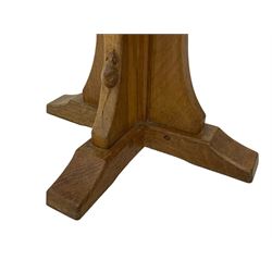 Mouseman - oak occasional table, octagonal adzed top, cruciform pedestal on sledge feet, carved with mouse signature, by the workshop of Robert Thompson, Kilburn 