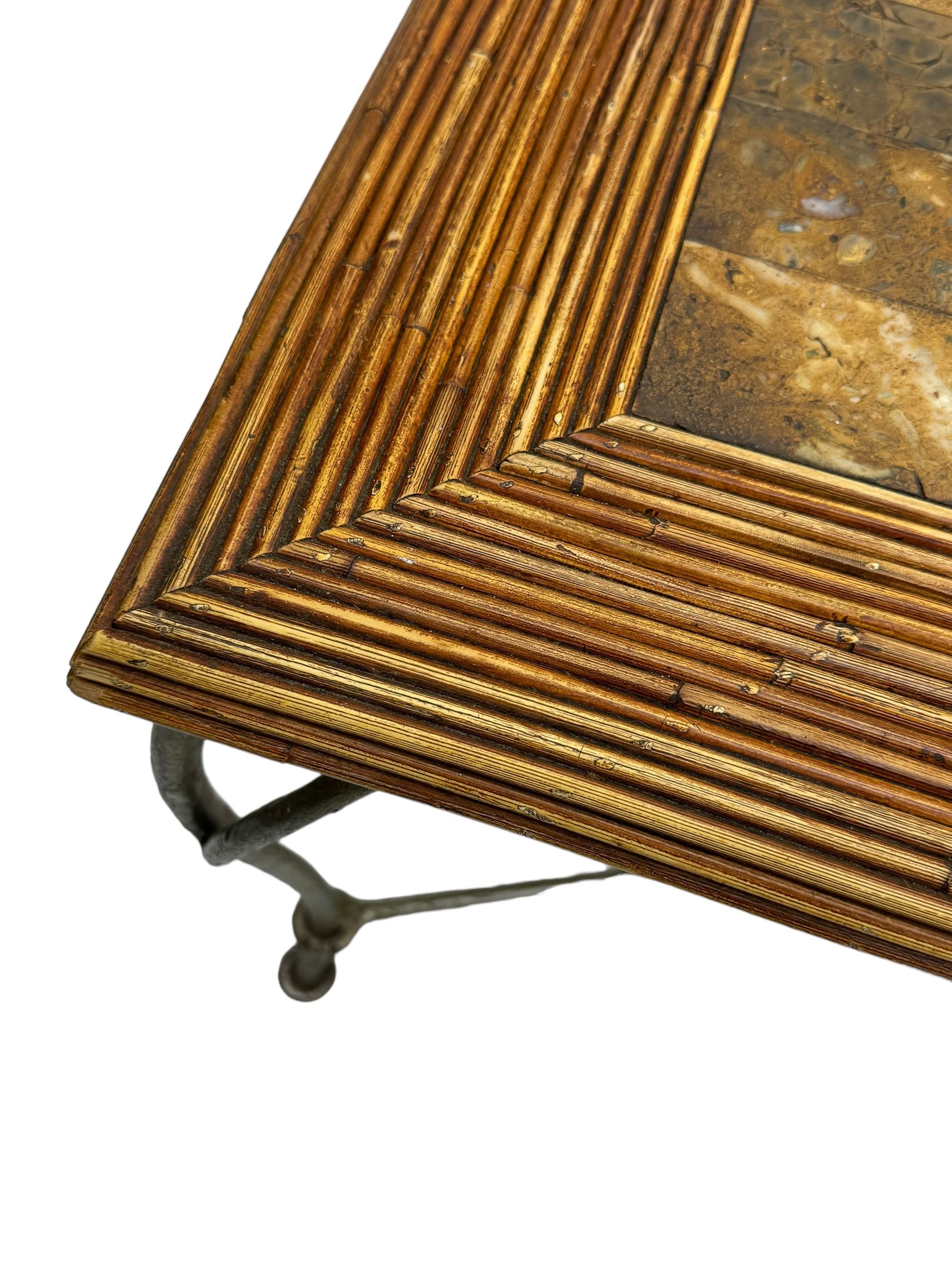 Mid-20th century coffee table, rectangular tiled wooden top framed by bamboo detailing, supported by wrought iron base with scrolled legs and central mosaic accent