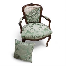 19th century gilt hardwood and wrought metal-framed nursing chair, shaped cresting and upholstered in buttoned fabric, on cabriole feet (W56cm, H74cm); 20th century stained beech French design fauteuil armchair, upholstered in green floral pattern silk fabric, on cabriole supports (W57cm, H87cm) (2)