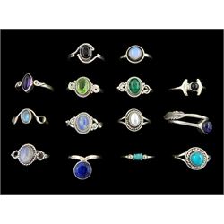 Fourteen silver stone set rings malachite, turquoise, moonstone, peridot, pearl and amethyst