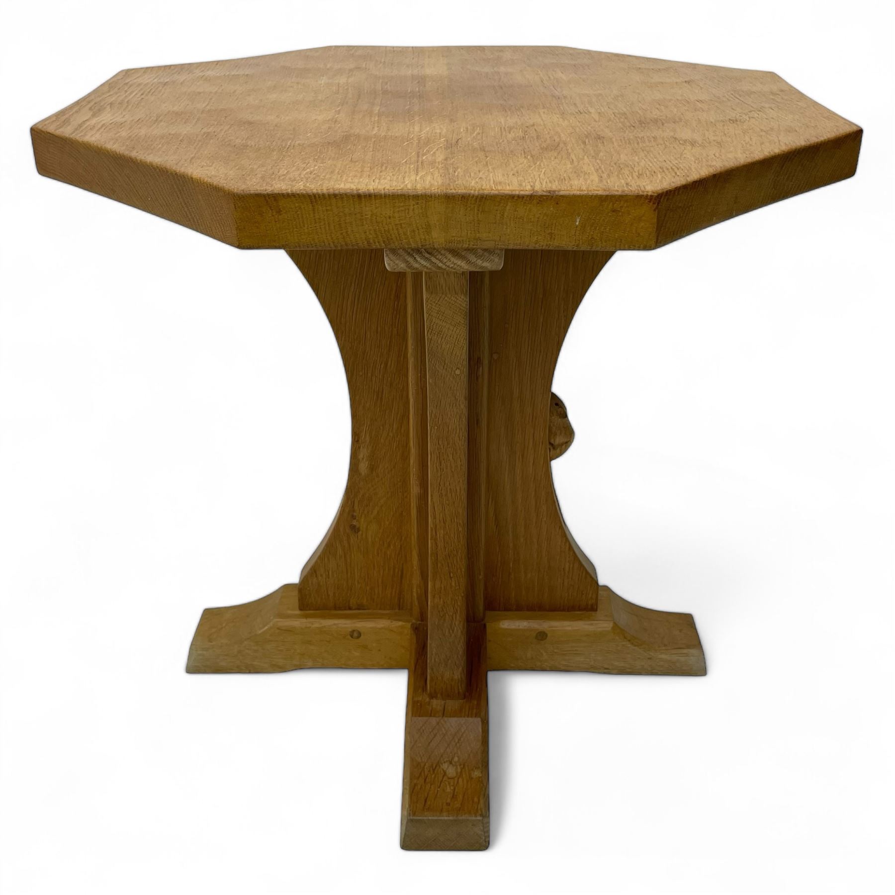 Mouseman - oak occasional table, octagonal adzed top, cruciform pedestal on sledge feet, carved with mouse signature, by the workshop of Robert Thompson, Kilburn 