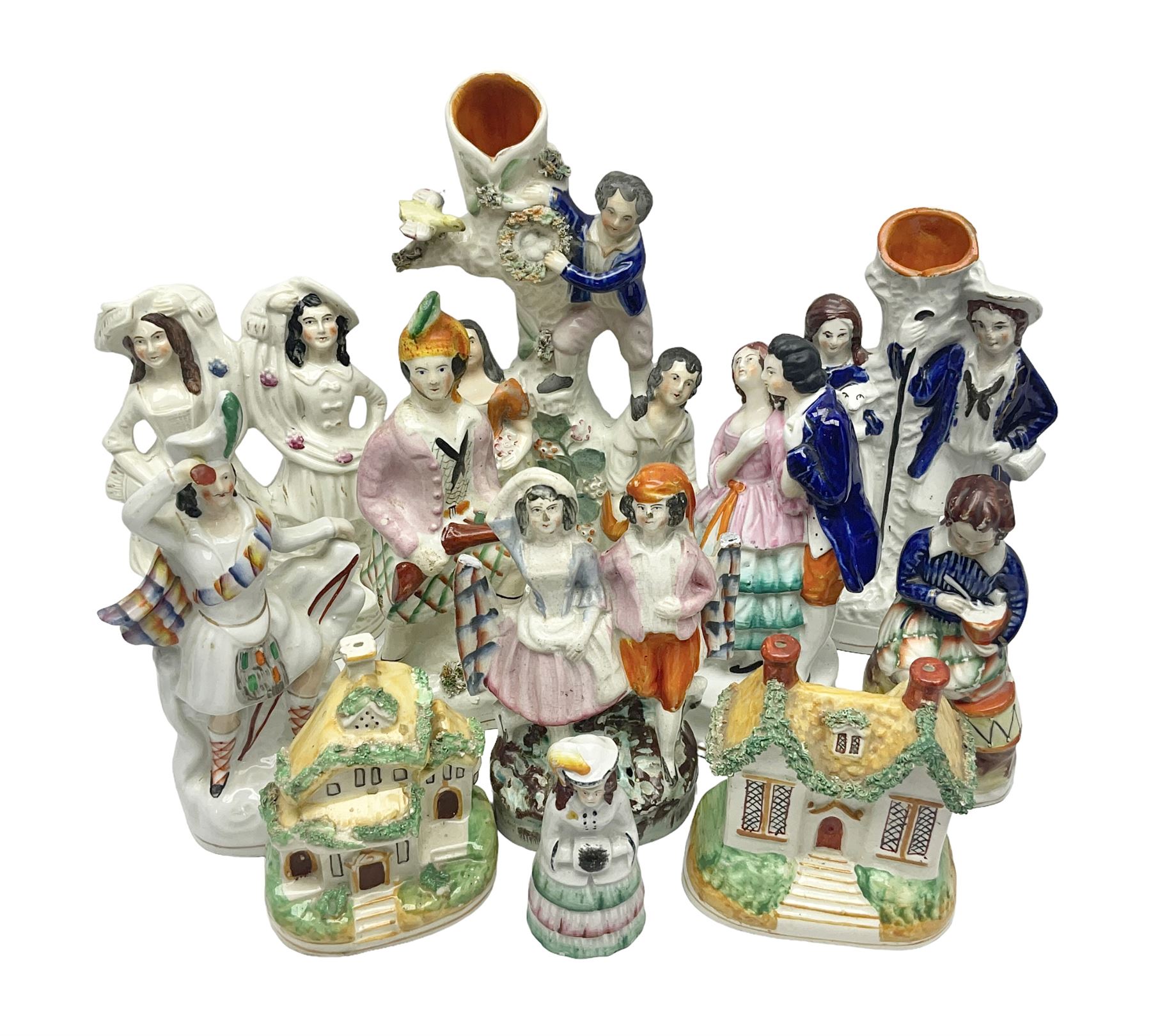 Collection of 19th century and later Staffordshire figures, including figure of a spill vases, figure groups and houses, tallest H28cm (11)