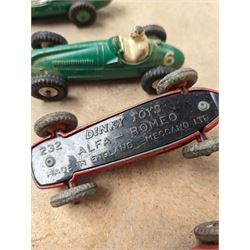 Four Dinky race cars, to include Cooper Bristol, two Alfa Romeos and a Vanwall