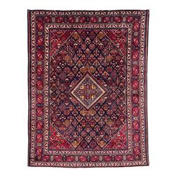 Persian Meimeh indigo ground rug, the central medallion within a field of small floral loz...