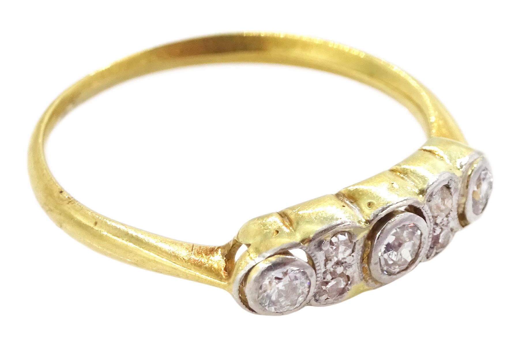 Early 20th century old cut diamond ring, three principal diamonds with two smaller diamonds set between, total diamond weight approx 0.25 carat