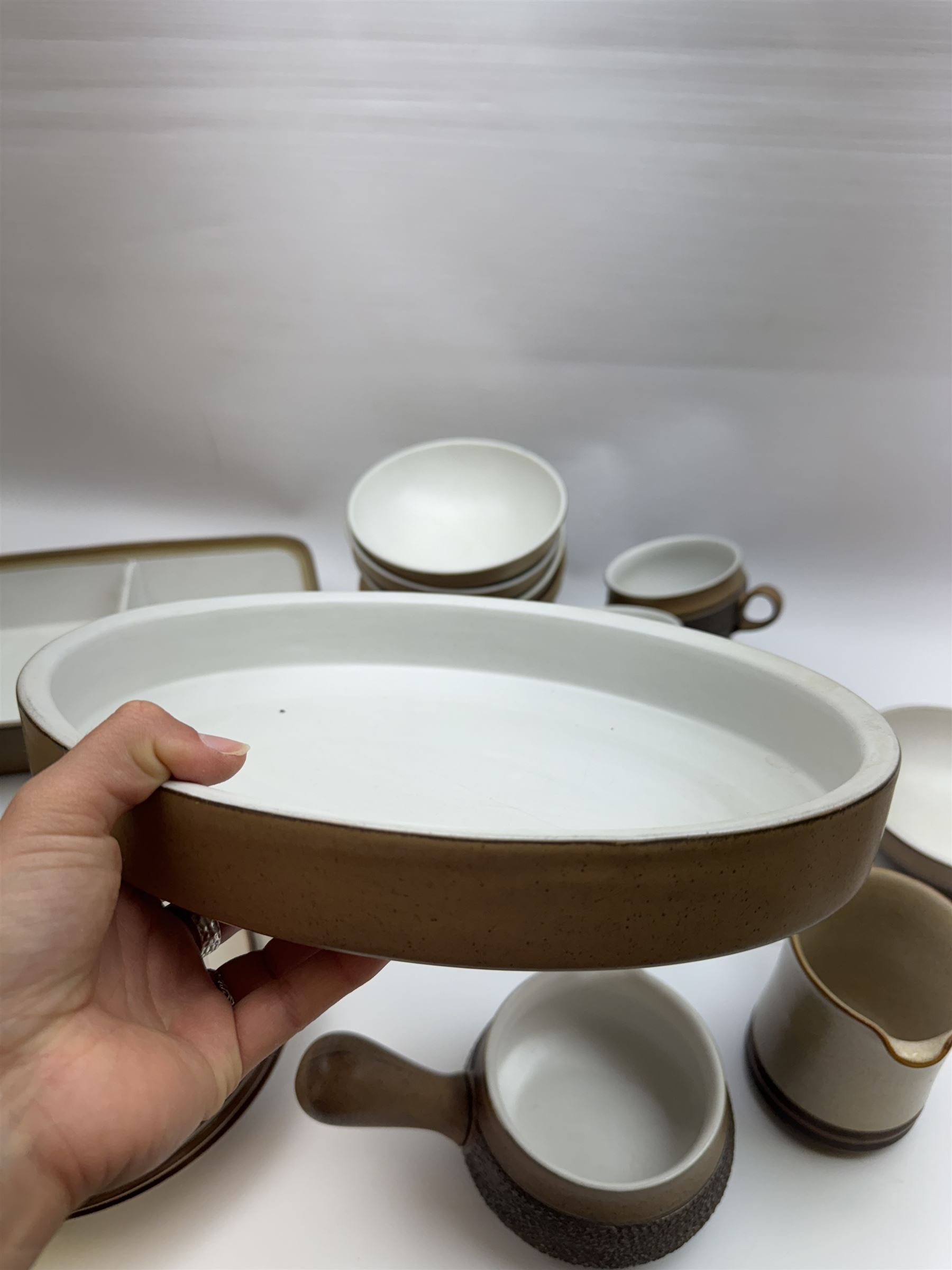 Denby Cotswold pattern, part tea and dinner service, including eight dinner plates, eight tea cups and saucers, serving dishes etc  