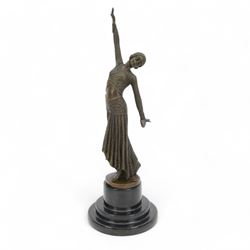 Art Deco style bronze figure, depicting a female dancer, upon a black circular stepped mar...