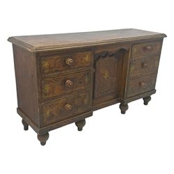 Victorian walnut scumbled pine sideboard, stepped rectangular top over central cupboard with marquetry inlay, flanked by two banks of three drawers fitted with round wooden knobs, raised on turned bun supports