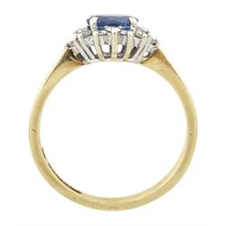 9ct gold oval sapphire and round brilliant cut diamond cluster ring, hallmarked London 1994, sapphire approx 0.55 carat, total diamond weight approx 0.25 carat