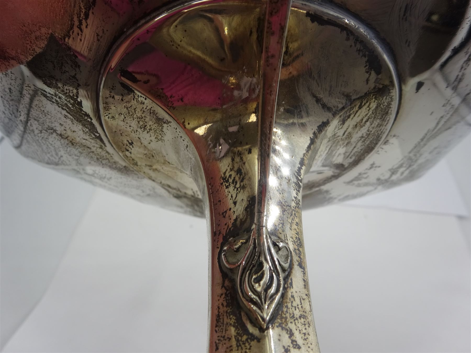 Early 20th century twin handled pedestal dish, of hexagonal form, with Art Nouveau inspired foliate mounted handles, upon a domed hexagonal foot, hallmarked Walker & Hall, Sheffield 1919, including handles H16.5cm