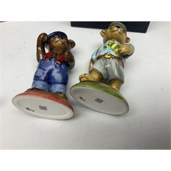 Eight Halcyon Days Teddy Bear of the Year figures, from 1993 to 2000, including one example modelled as a bear in Greek dress carrying a torch, one example modelled as a schoolboy and one example in a blue dress, all boxed 