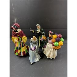 Four Royal Doulton figures, comprising The Parson's Daughter HN564, Dorothy HN3098, Christmas Parcels HN2851 and Biddy Pennyfarthing HN1843