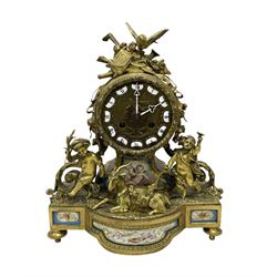 French mid-19th century gilt/brass 8-day mantle clock, with a sculpted depiction of the Go...