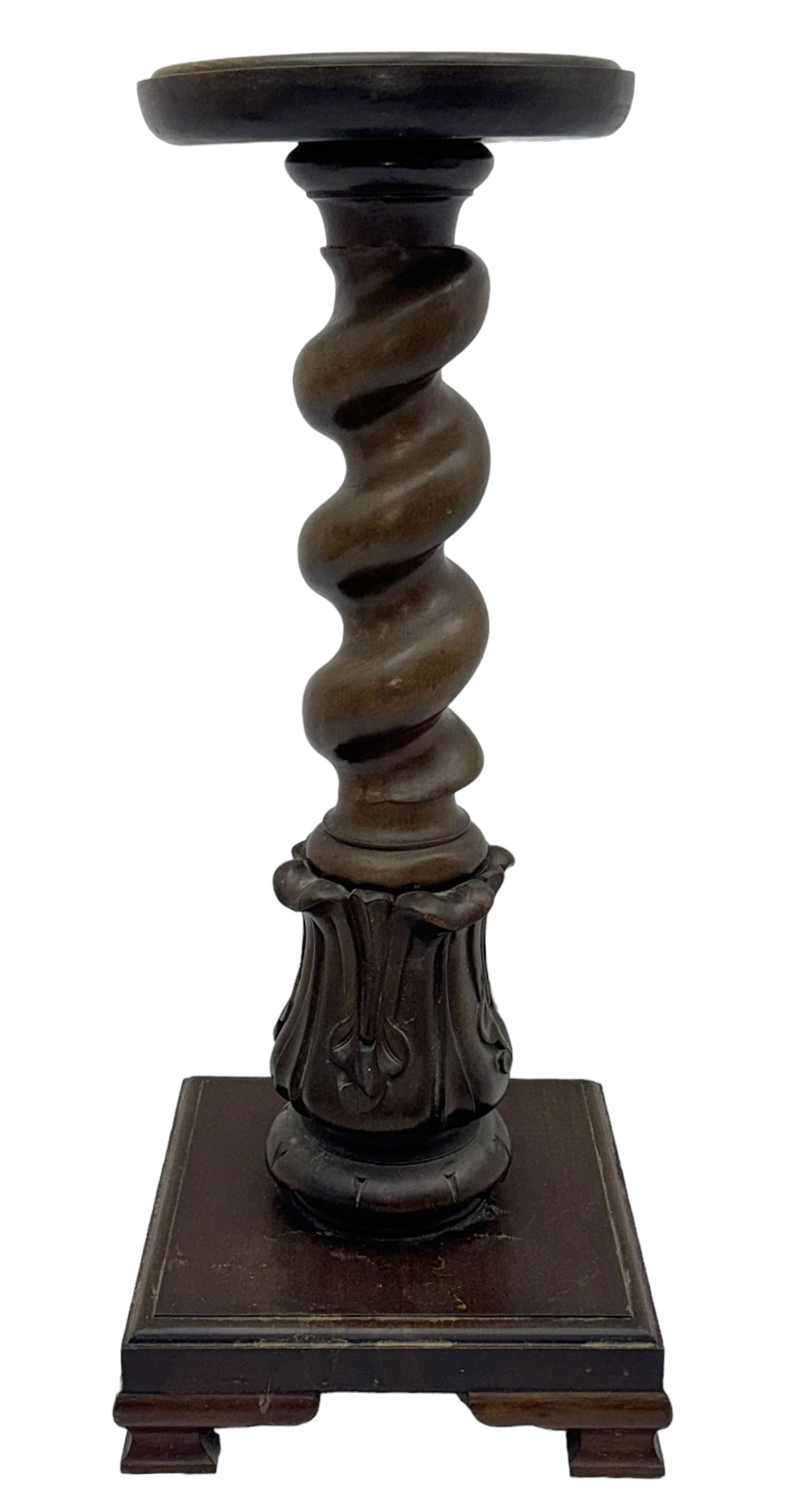 Late 19th century mahogany plant stand or torchère, circular top over barley twist column and carved acanthus base, on square plinth with bracket supports