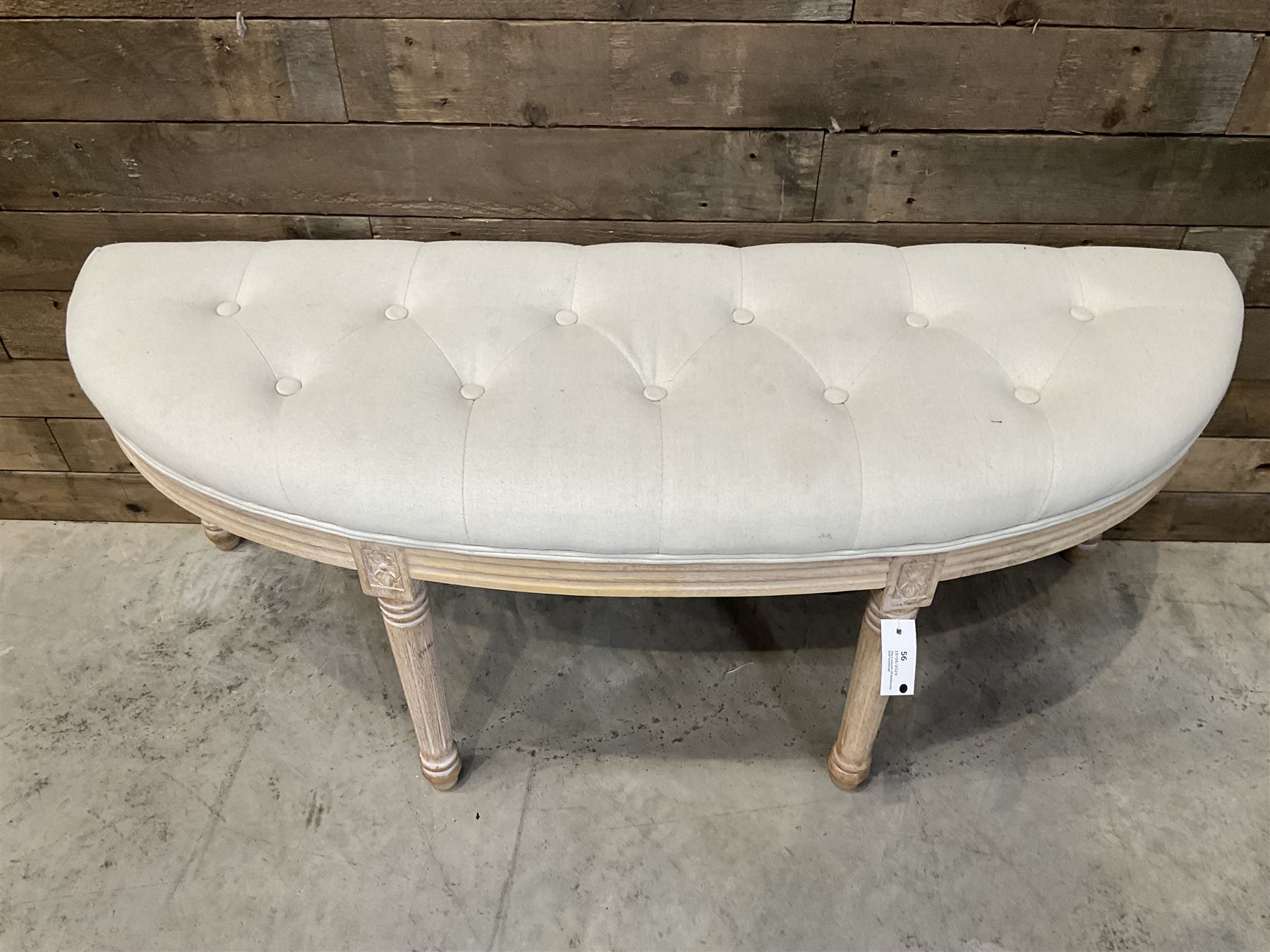 Washed oak demi-lune window seat, upholstered in buttoned linen fabric