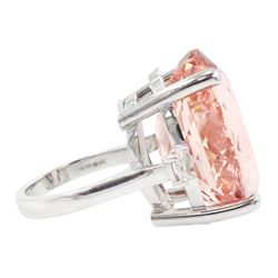 Platinum three stone large oval cut morganite and oval cut diamond ring, hallmarked, morganite 33.80 carat, total diamond weight 0.60 carat, with World Gemological Institute report