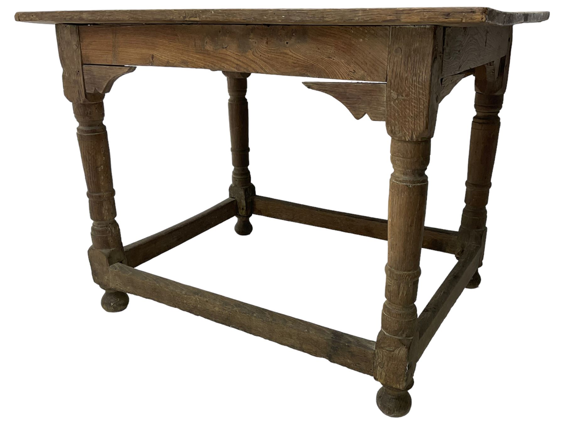 18th century oak joined table, rectangular pegged plank top on turned supports united by plain stretchers