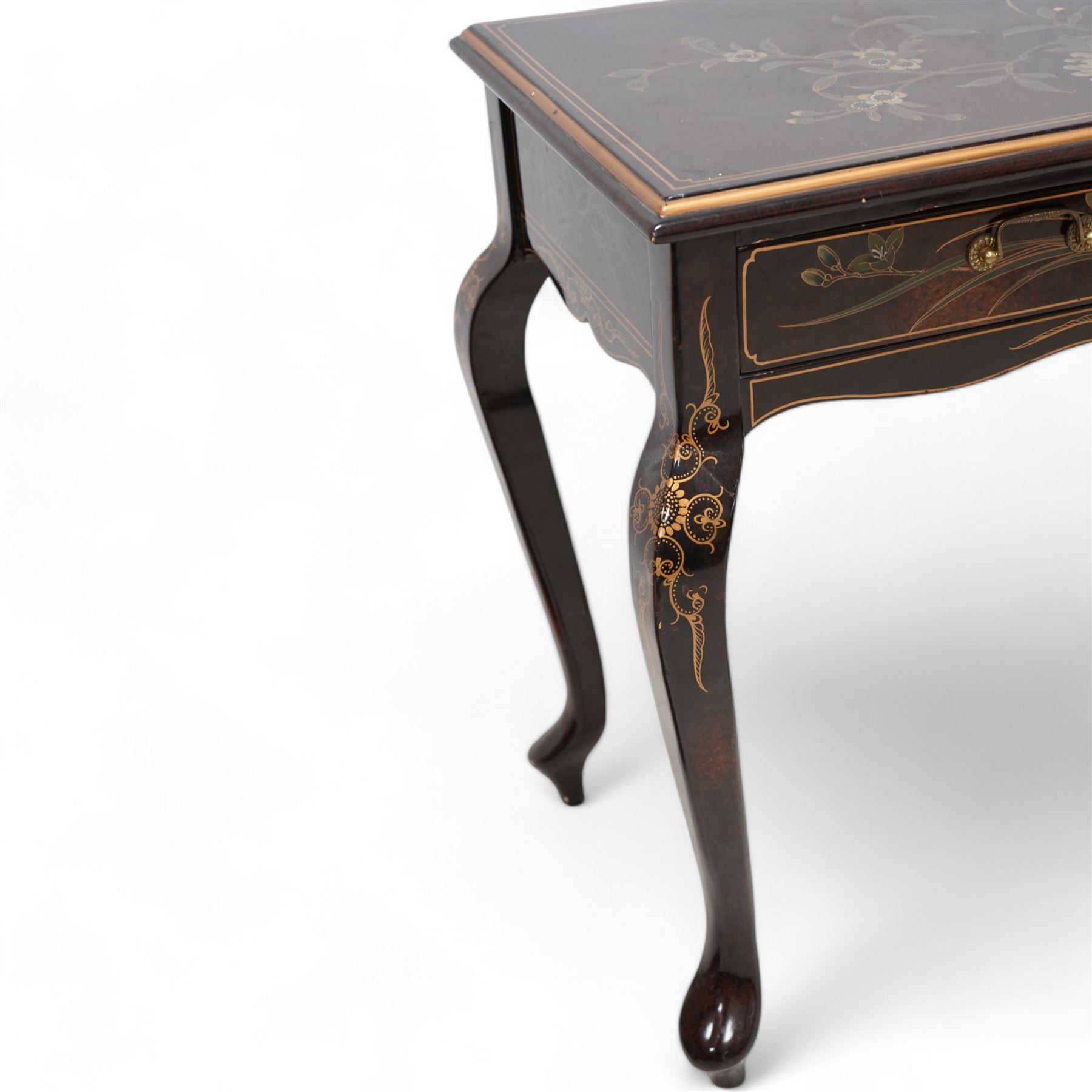 Chinese chinoiserie lacquered side table, fitted with two drawers, on cabriole supports, decorated with painted and gilt floral scenes