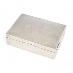 1920s silver mounted playing card box, of rectangular form, the hinged cover with engine t...