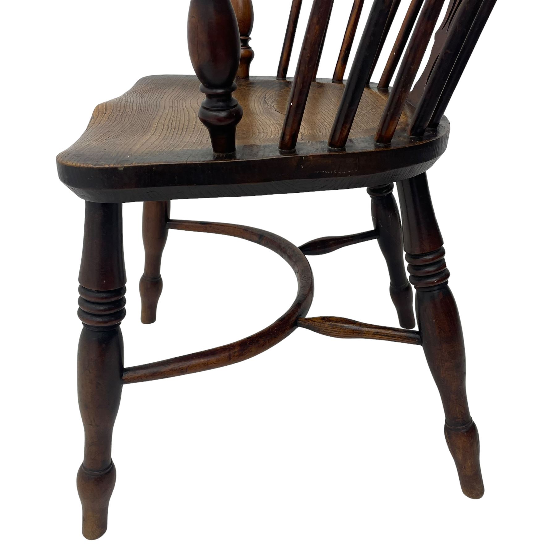 19th century yew wood and elm Windsor armchair, low double hoop stick and pierced splat back, dished seat on turned supports united by crinoline stretchers