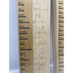 Two signed Yorkshire County cricket bats, from 2011 and 2012 seasons, bearing signatures including Adil Rashid, Andrew Gale, Ryan Sidebottom, Gary Ballance etc